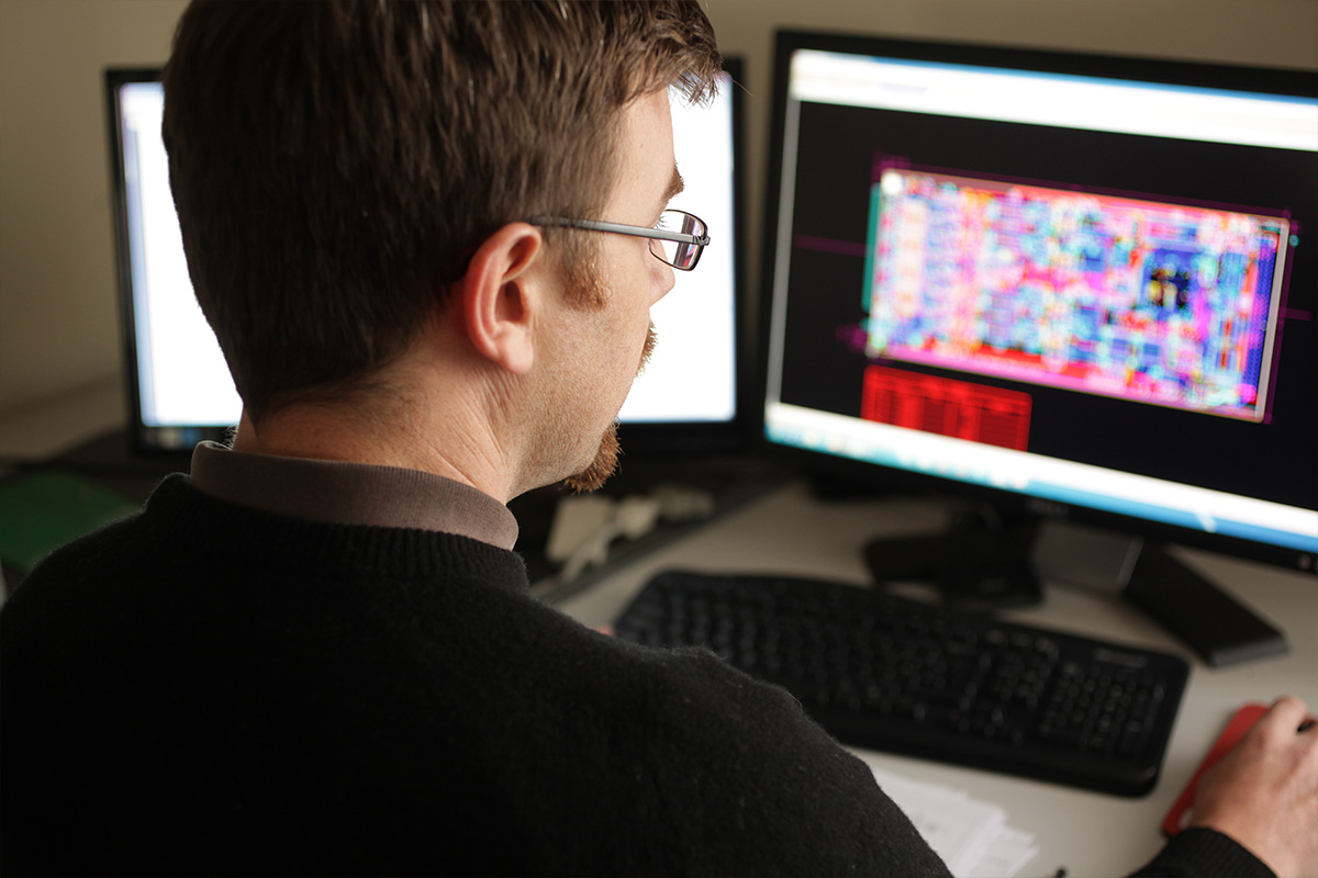 Man analysing computer data